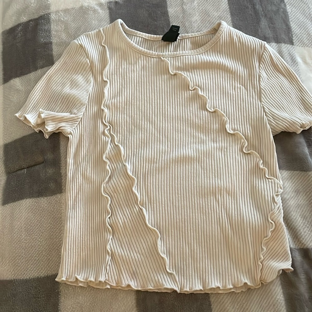 White/creamish colored ruffled crop top